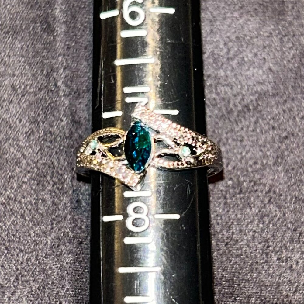 Blue Teal Stone set in Silver Tone  Size 7.5